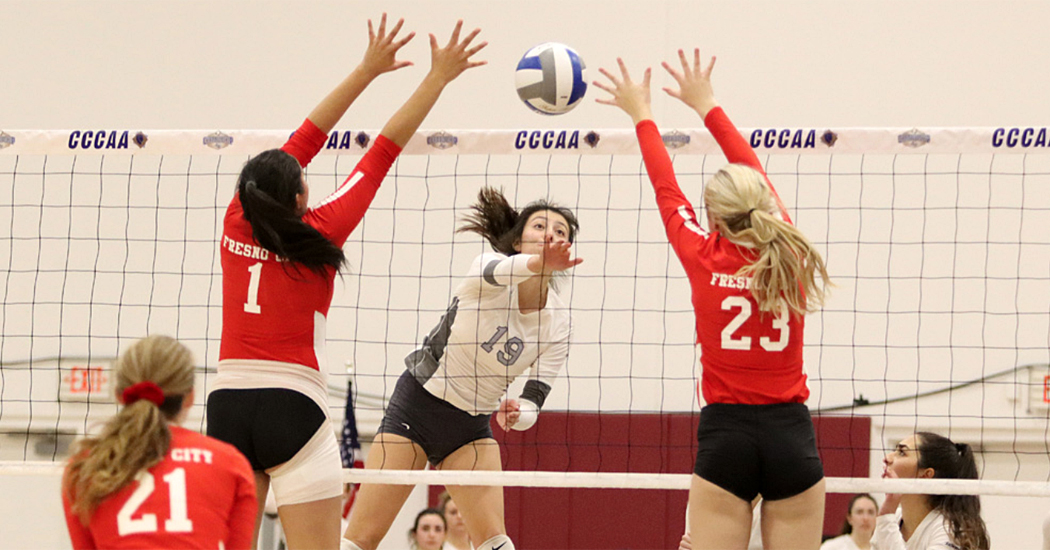 FCC's Marina Gonzalez (1) and Chloe Duke (23) go up for a block in the state championship semifinals against Irvine Valley. (Photo by CCCAA)